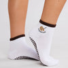 Souls Good Fortune white and chocolate grip socks worn with soles visible