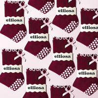 Ribbed fabric and pink bow detail on Elliosa Bordeaux Bow grip socks