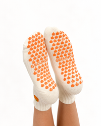 Cream cropped crew grip socks with orange pumpkin detail