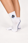 Doxie Darling white crew grip socks with embroidered dachshund in blue bandana and sunglasses