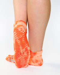 Orange floral Pointe Studio Poppy grip sock with full-foot coverage