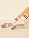 Lucky Honey Cat Walk Crew grip socks in Safari Stripes, with animal-pattern cuff stripes and brown grip soles