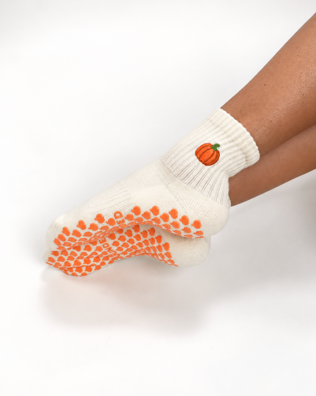 Cream pumpkin grip socks for Pilates, Lagree and Barre