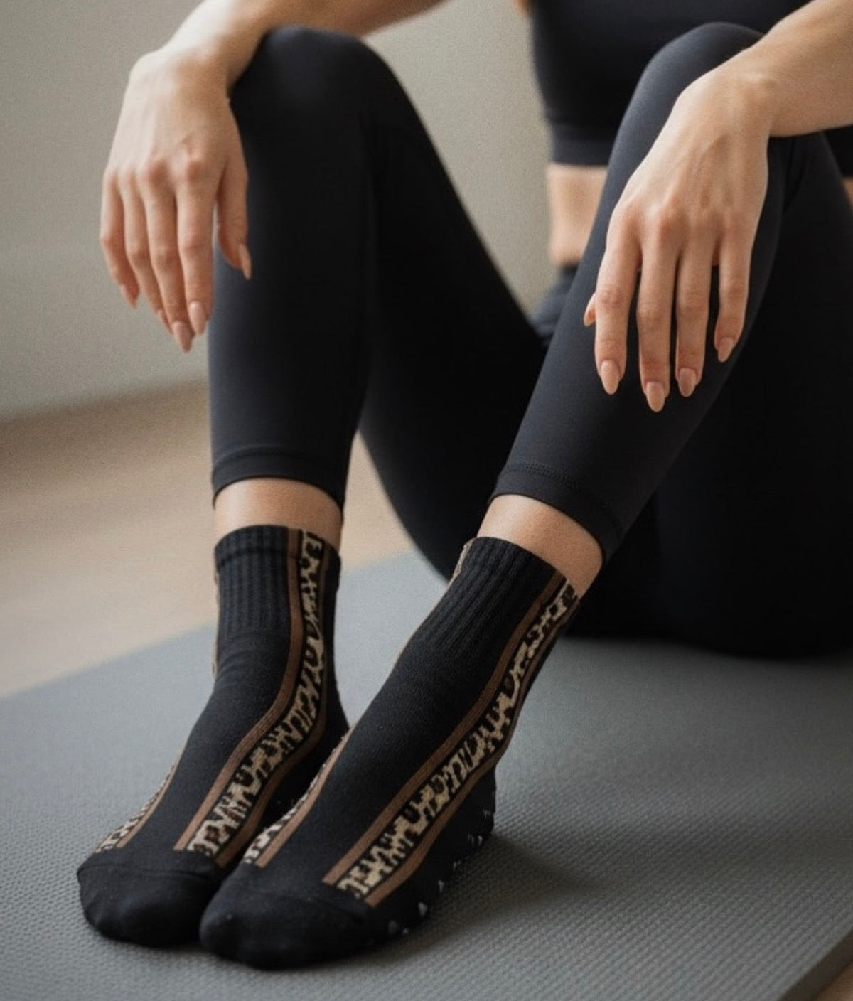 Cheetah Core Black grip socks showing black heart-shaped silicone grips