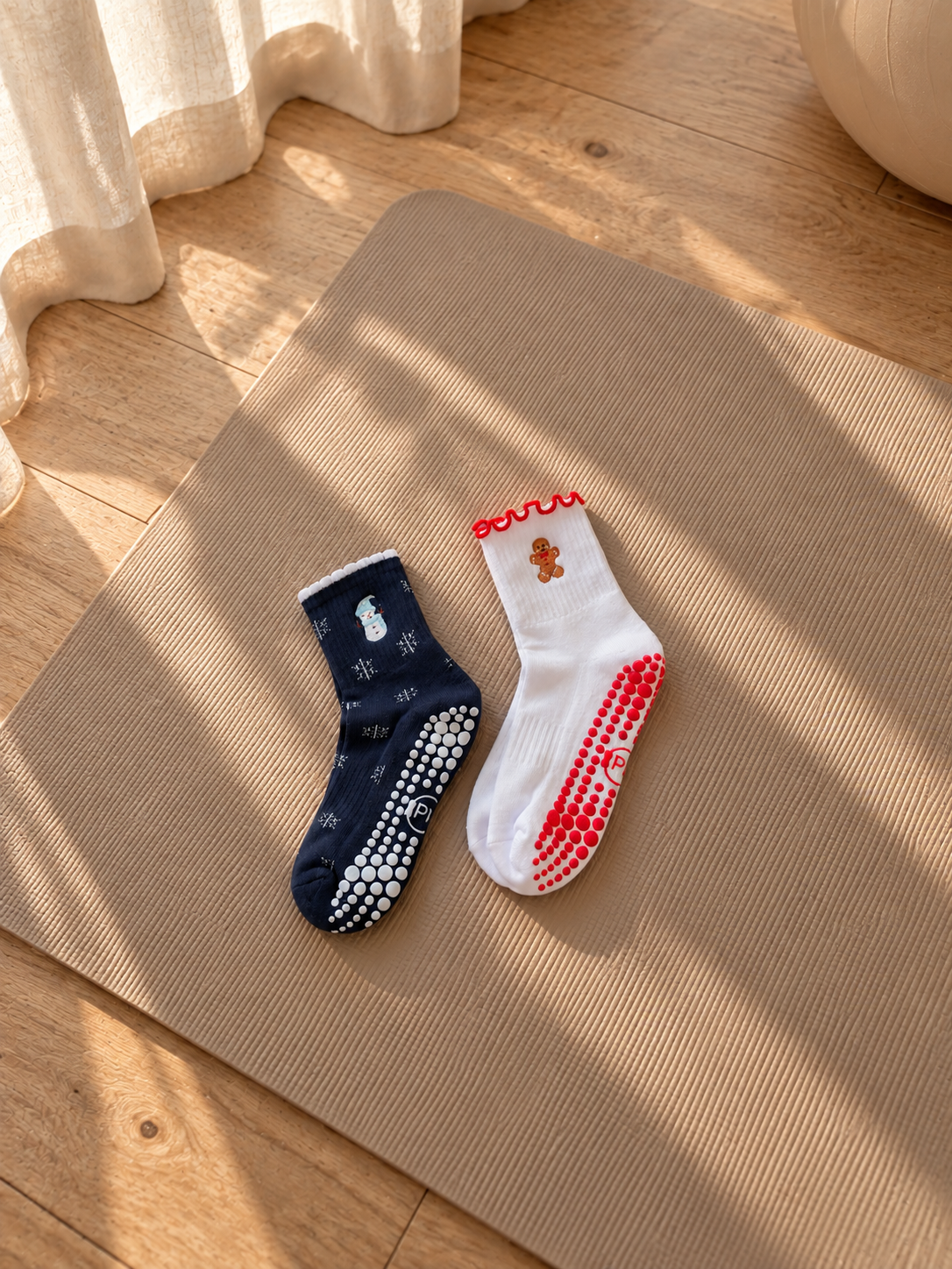 Pilates People Winter Wonderland dark blue grip socks with snowflakes, snowmen and white scalloped cuff — view 7