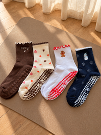 Pilates People Winter Wonderland dark blue grip socks with snowflakes, snowmen and white scalloped cuff — view 8