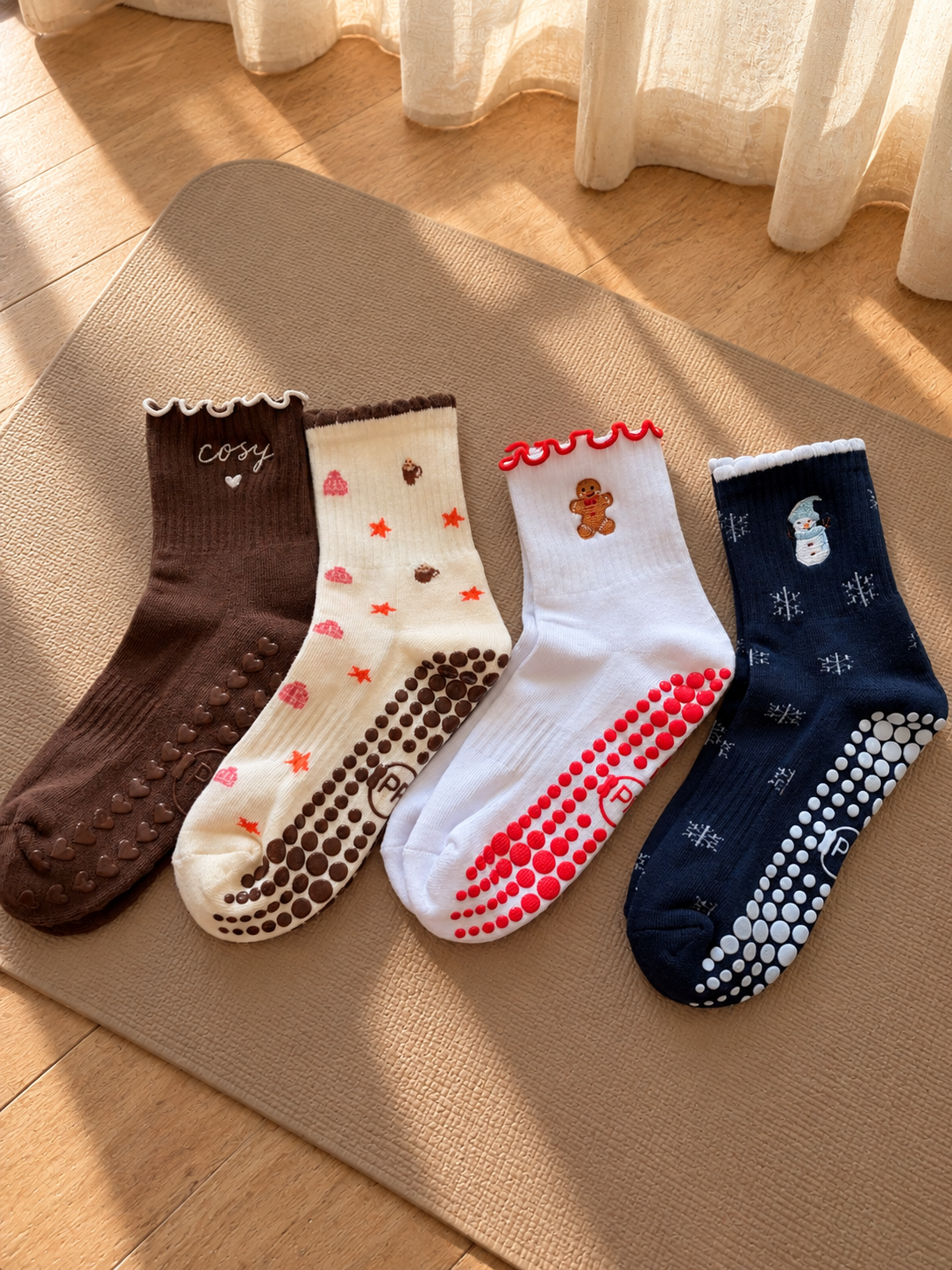 Pilates People Christmas Cheer white grip socks with festive embroidery and red scalloped cuff — view 7
