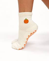 Grounded Pumpkin Patch cream crew grip socks with embroidered pumpkin