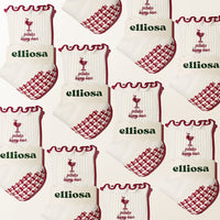 Pilates Happy Hour cream crew grip sock pattern with red and green details