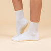 Maison Joie Muse white short-crew grip socks with yellow scalloped cuff and yellow grips