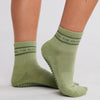 Feel The Burn Grip Socks in olive green front view