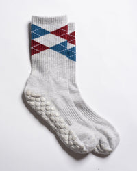 The Legacy grey argyle grip socks by Revel Athletic, product view