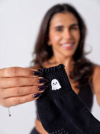 Ghost Ruffle grip socks lifestyle view