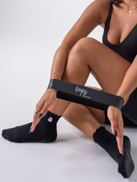 Ghost Ruffle grip socks with resistance loop