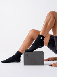 Ghost Ruffle grip socks with yoga block