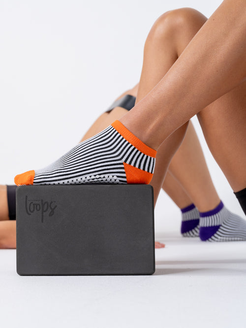 Fright Club Orange grip socks with yoga block