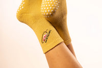 Sazón Grip I Like You Elote mustard yellow crew grip socks
