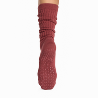 Tavi Stacy slouch grip sock in Terra Rouge, grip sole view