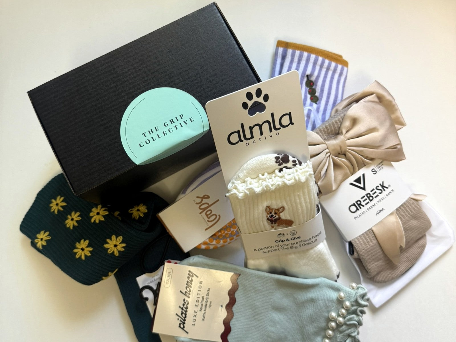 The Edit grip sock subscription box with a curated assortment of specialty grip socks